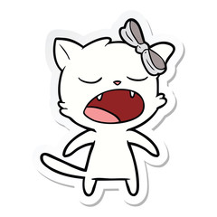 Obraz na płótnie Canvas sticker of a cartoon meowing cat