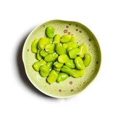 broad bean in a bowl isolated on white background