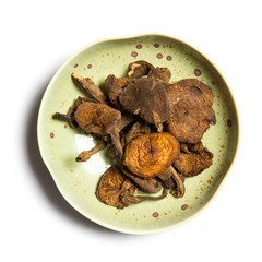 dried mushrooms on white background.