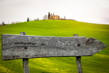 Wooden signpost and free space for your decoration 