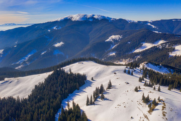 Mountain winter scene, aerial sunny day view