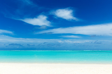 Fototapeta na wymiar Maldives island with white sandy beach and sea