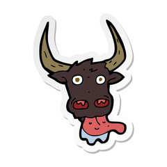 sticker of a cartoon cow face