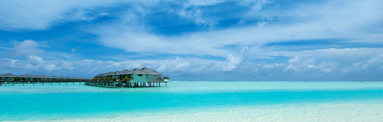  Maldives island with white sandy beach and sea