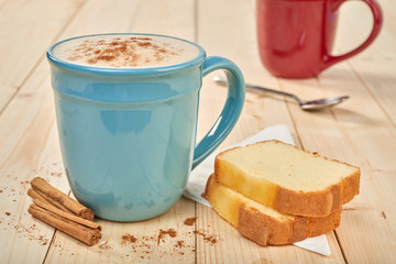 coffee with pound cake on wooden table