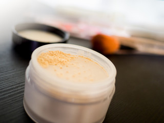 Jar of face powder. Tools make-up