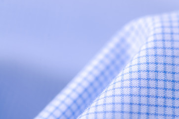 Fabric blue white cage shirt textile material texture blur background macro