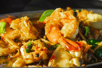 Thai food sea food stir fry with herb and spice