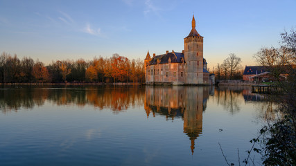 Fototapeta premium Calm sunset and reflections Kasteel van Horst near Holsbeek, Vlaanderen, Belgium