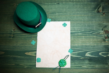 St. Patrick's Day. Leprechaun hat with empty blank and wax seal with shamrock