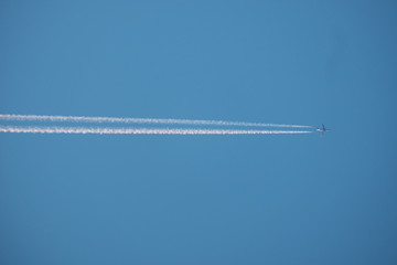 Airplane flying through the sky
