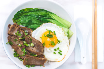 Porky Bowl Homemade char siu with rice and sunny side up & siew pak choy