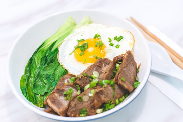 Porky Bowl Homemade char siu with rice and sunny side up & siew pak choy