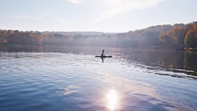 Paddle-boarding on a lake - aerial footage