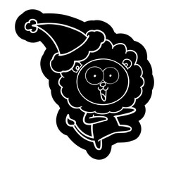 Naklejka premium happy cartoon icon of a lion wearing santa hat