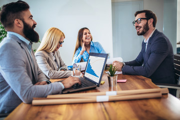 Business people working together on project and brainstorming in office