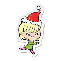 distressed sticker cartoon of a woman wearing santa hat