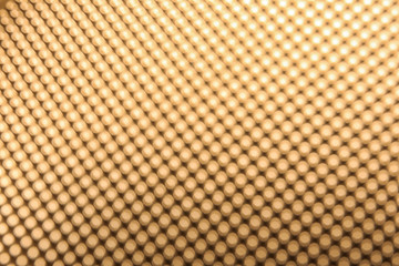 Blurred view of golden surface as background