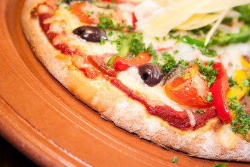 Yummy pizza with vegetables and cheese