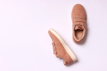  Children's shoes on a white background top view. Children's footwear.