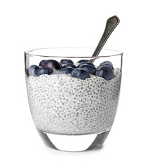 Tasty chia seed pudding with blueberries in glass on white background
