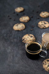 cup of espresso and chocolate chip cookies
