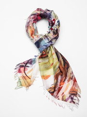 Multicolor scarf on white background. Top view.