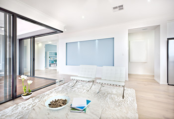 Luxury living room and glass door entrance to inside