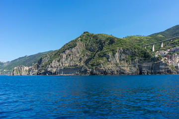 Obraz premium The cityscape of Riomaggiore viewed from the sea, Cinque Terre, Italy, Riviera