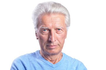 Portrait of thinking senior man on white background