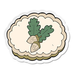 sticker of a cartoon acorn symbol
