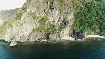 Aerial drone shot of high mountain covered with tropical forest. Tropical landscape. Travel concept Philippines,El Nido.