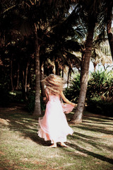 dancing girl barefoot on the grass