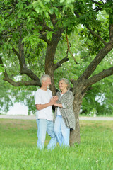 Portrait of senior couple in the park