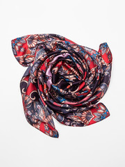 Multicolor scarf on white background. Top view.