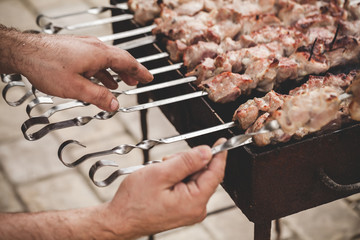 Outdoor cooking of a pork Shashlik
