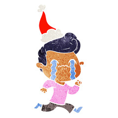 retro cartoon of a man crying wearing santa hat