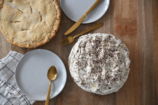 Pie and whipped cream topping with chocolate shavings