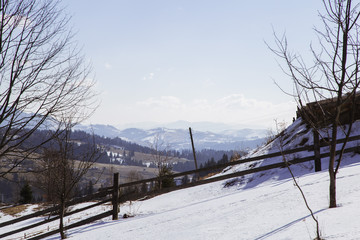 Obraz premium Winter landscape in the Carpathian mountains with gutsul culture.