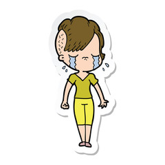 sticker of a cartoon crying girl