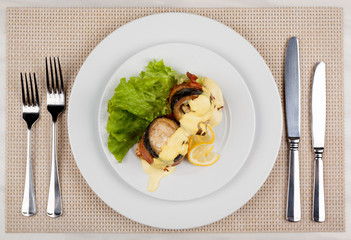 Eggplant and bacon rolls with cheese, lemon and green salad.