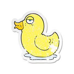 retro distressed sticker of a cartoon rubber duck