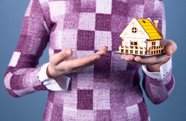 businesswoman and house