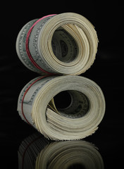 rolled dollars banknotes