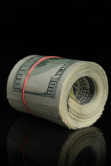 rolled dollars banknotes