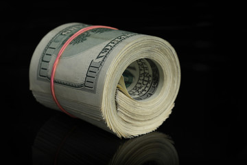 rolled dollars banknotes