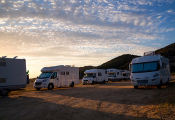 RV Campers On the Beach At Sunset