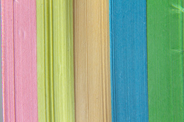 abstract background of multicolored paper strips. the texture of the paper