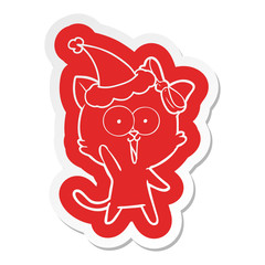 cartoon  sticker of a cat wearing santa hat