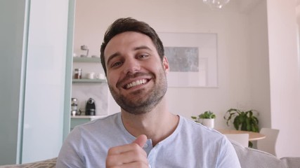 happy young man having video chat using webcam at home waving at baby sharing lifestyle father enjoying online connection on horizontal screen